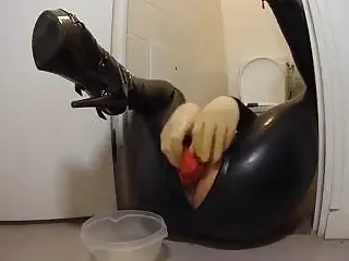 Horny freak in latex destroys ass with big toys BDSM