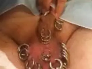 Nasty guy got his cock tortured with piercings BDSM porn