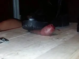 Dude's cock is tied up and stepped on by domme