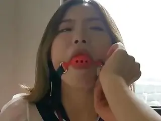 Sluty Asian girl enjoys BDSM playing with her tempting mistress