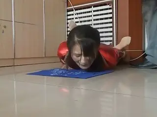 Sluty Asian girl enjoys BDSM and whipping on a floor